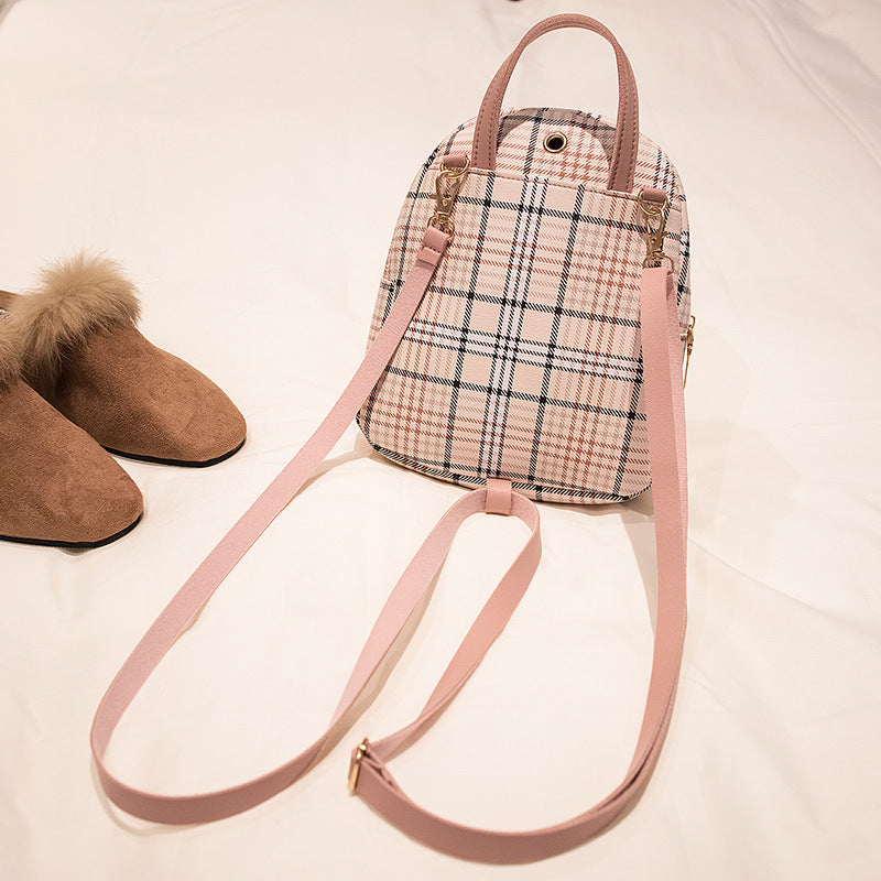 Mochila pequeña para dama a cuadros con broche y monedero